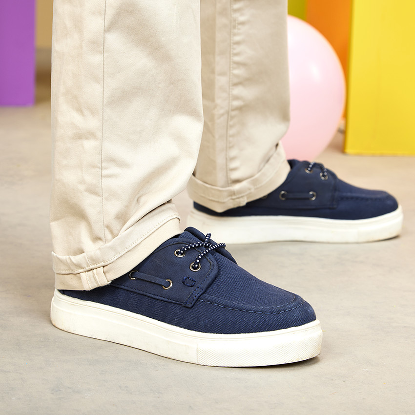 Zapatillas bajas de barco bi-materia con cordones elásticos para niño 