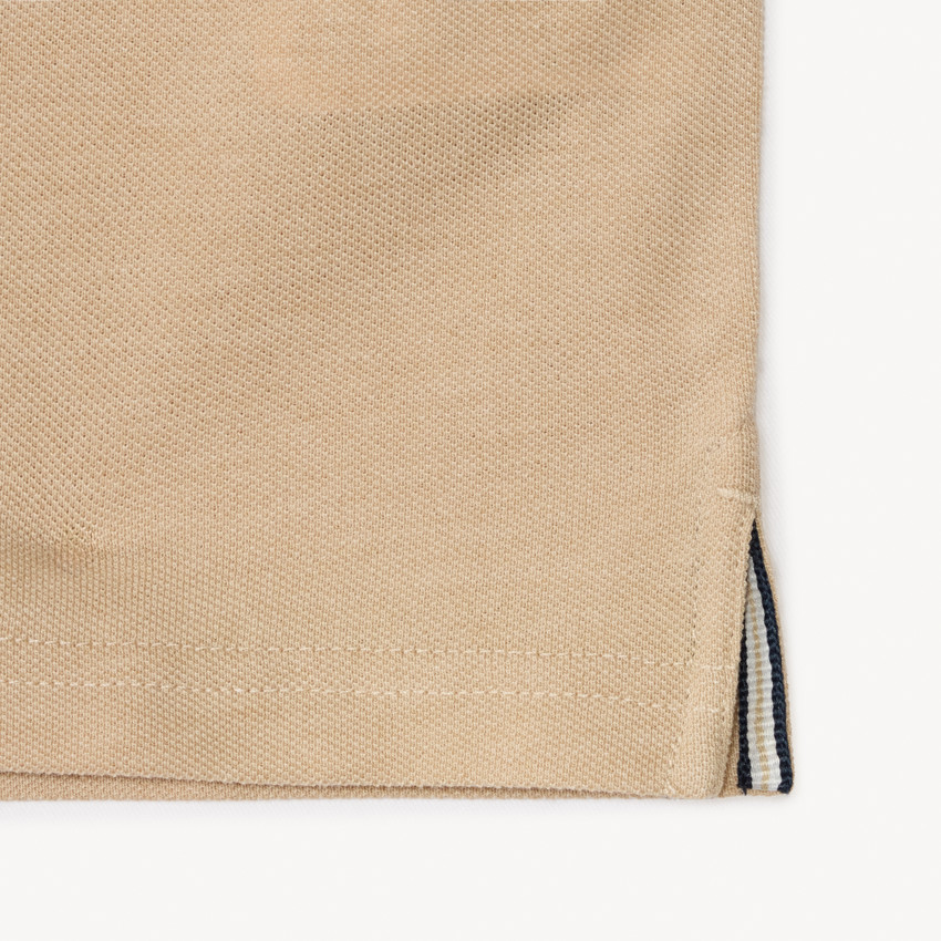 Polo de algodón de manga corta en color liso para niño 