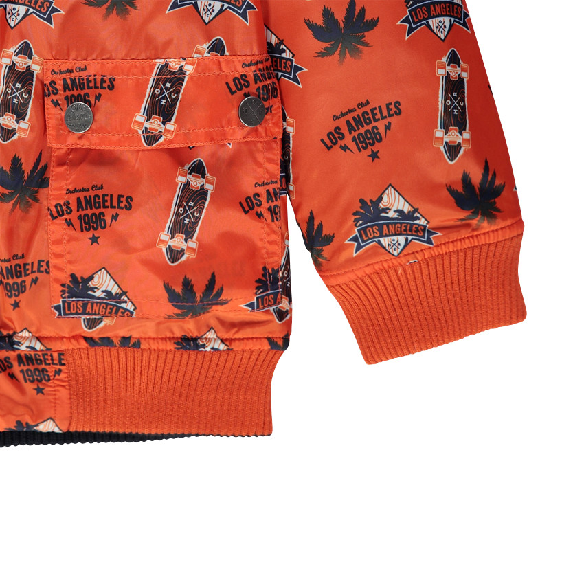 Cortavientos reversible con capucha extraíble estampado/liso 