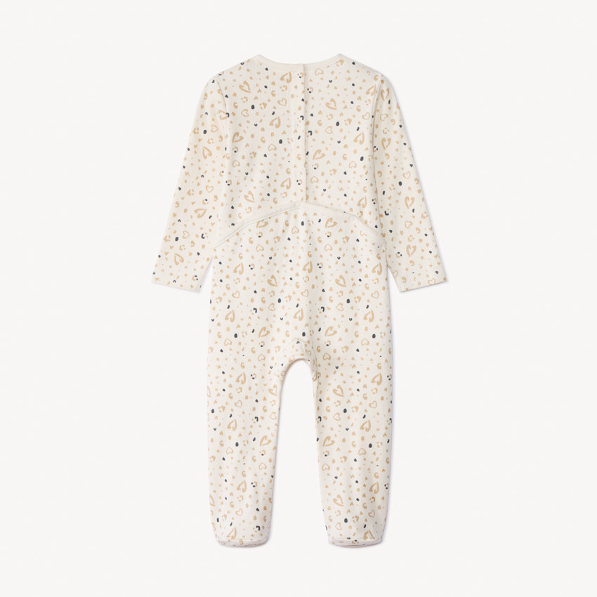 Pelele imprimido corazones para bebé niña con aberturas diferentes según la edad 