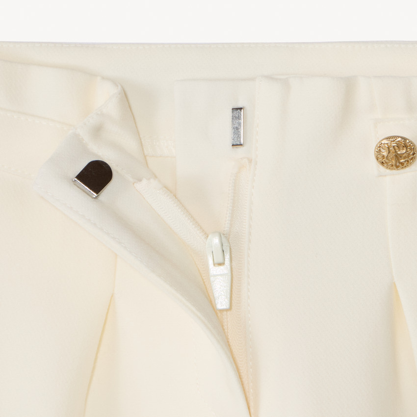 Pantalón amplio con pinzas uni para niña 