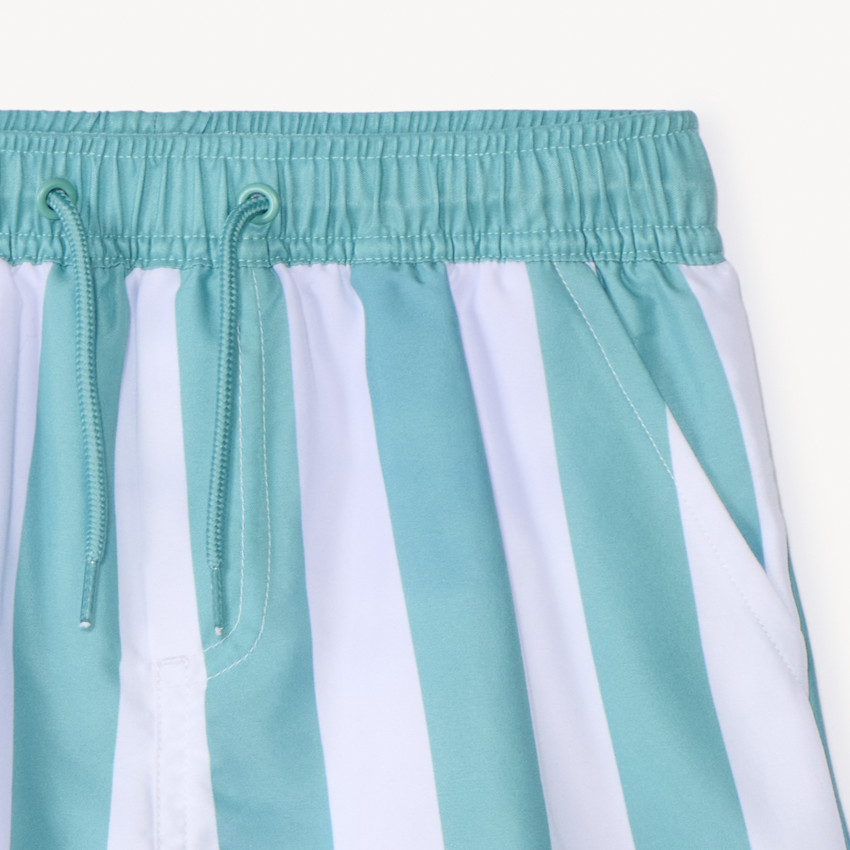 Bañador a rayas con insignia de goma para niño 