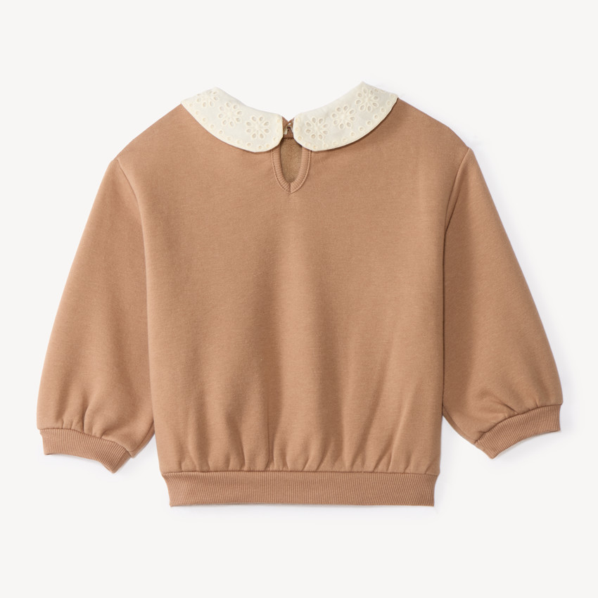 Sudadera niña oversized con cuello Peter Pan desmontable y estampado divertido. 