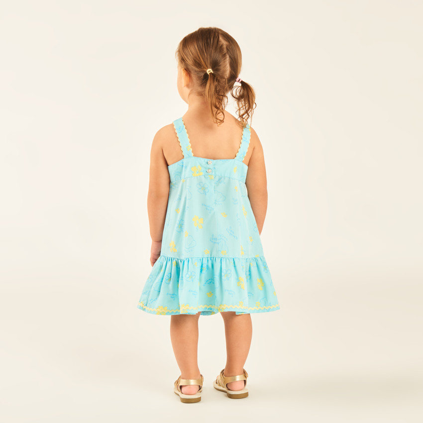 Vestido de tirantes en tela tubular con estampado de conchas y flores para niña bebé. 
