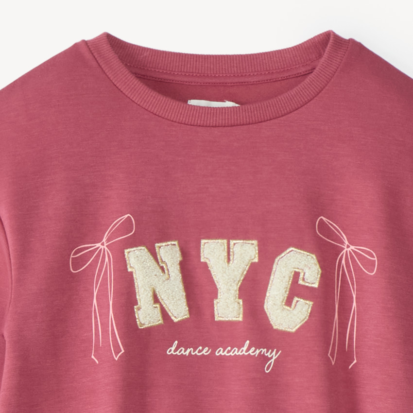 Conjunto de chándal para niña con estampado fantasía brillante. 