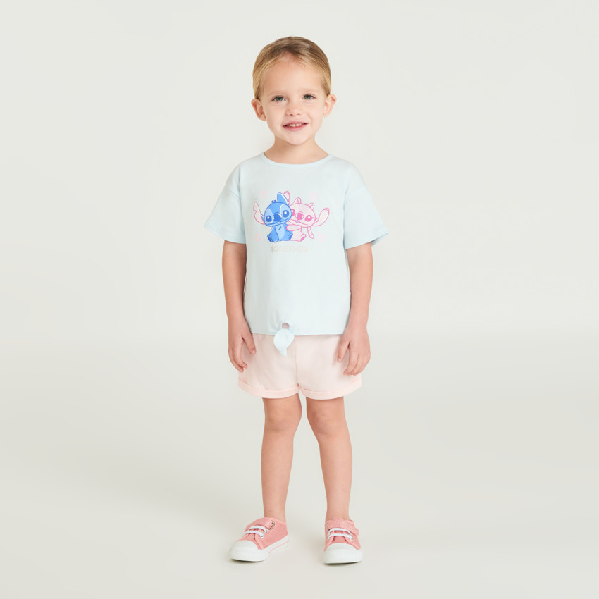 Camiseta de manga corta anudada con Stitch y Angel de Disney para niña. 