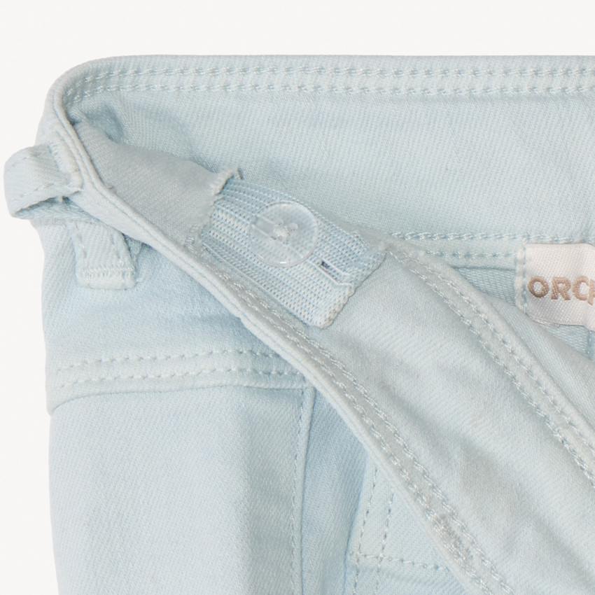 Jean ancho liso con botones de imitación de cuerno para niña 