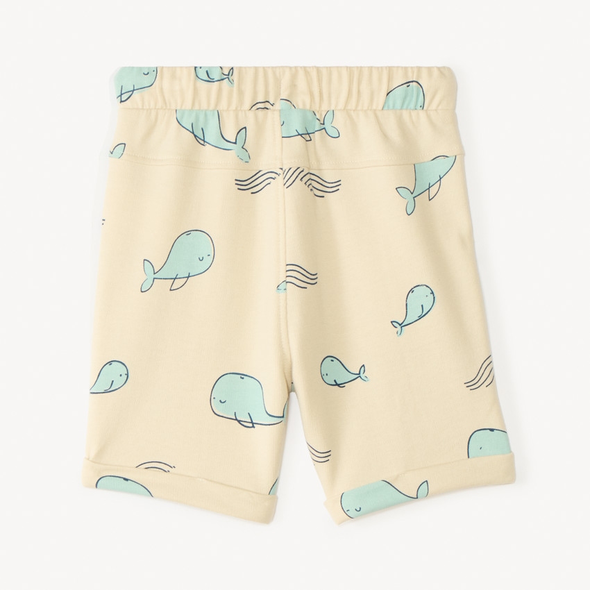 Pantalón corto de punto con estampado de ballena niño. 