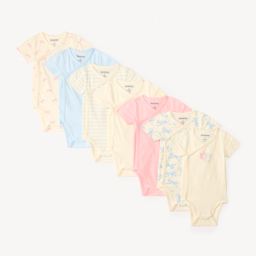 Conjunto de 7 bodies de manga corta con diseño de lazo para niña, apertura diferente según la edad. 