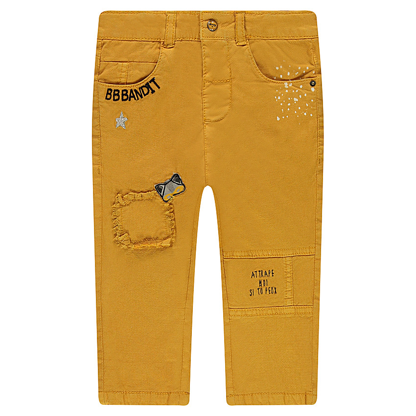 Pantalón de tela de fantasía con parches y bordados  