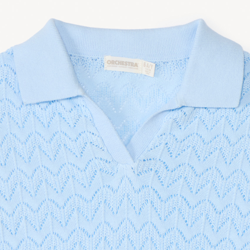 Suéter de punto calado de manga corta para niña. 