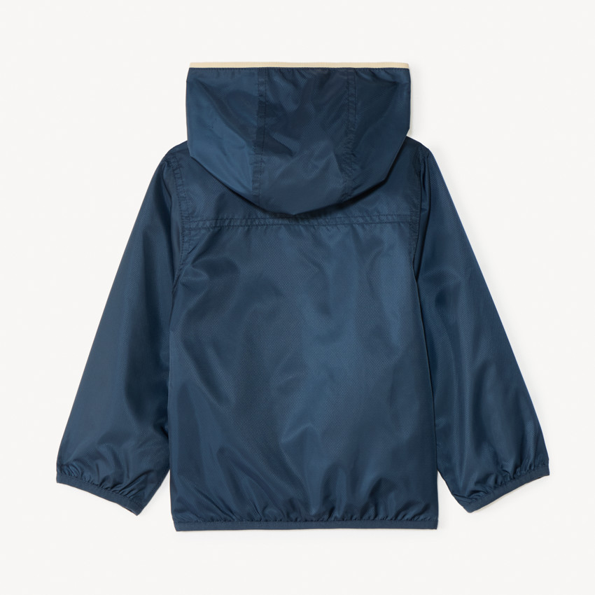 Cortavientos liso forrado en jersey para niño. 