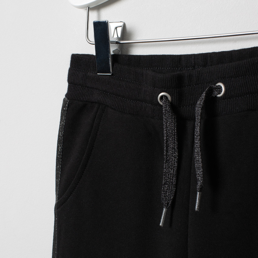 Pantalón de chándal con lentejuelas mágicas y pantalón con bandas plateadas 