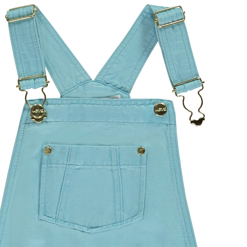 Salopette corta en tela lisa para niña 