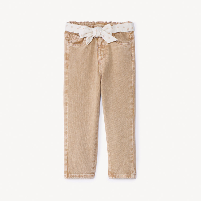 Jean efecto desgastado con cinturilla para atar para niña bebé. 