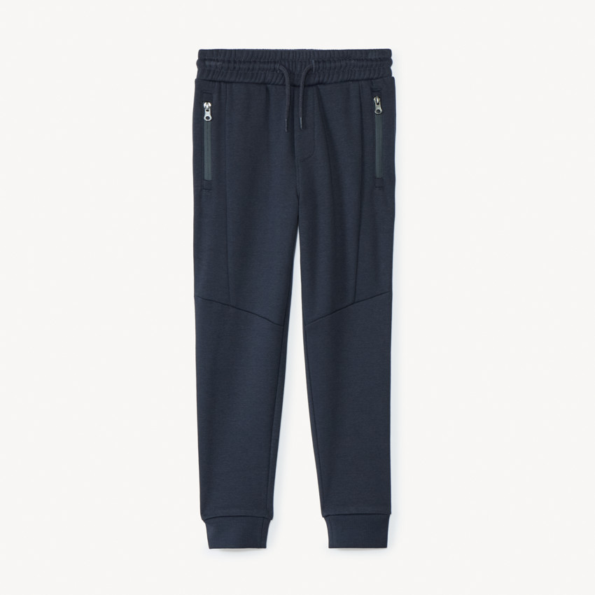 Pantalón de chándal de felpa lisa con bolsillos con cremallera para niño 