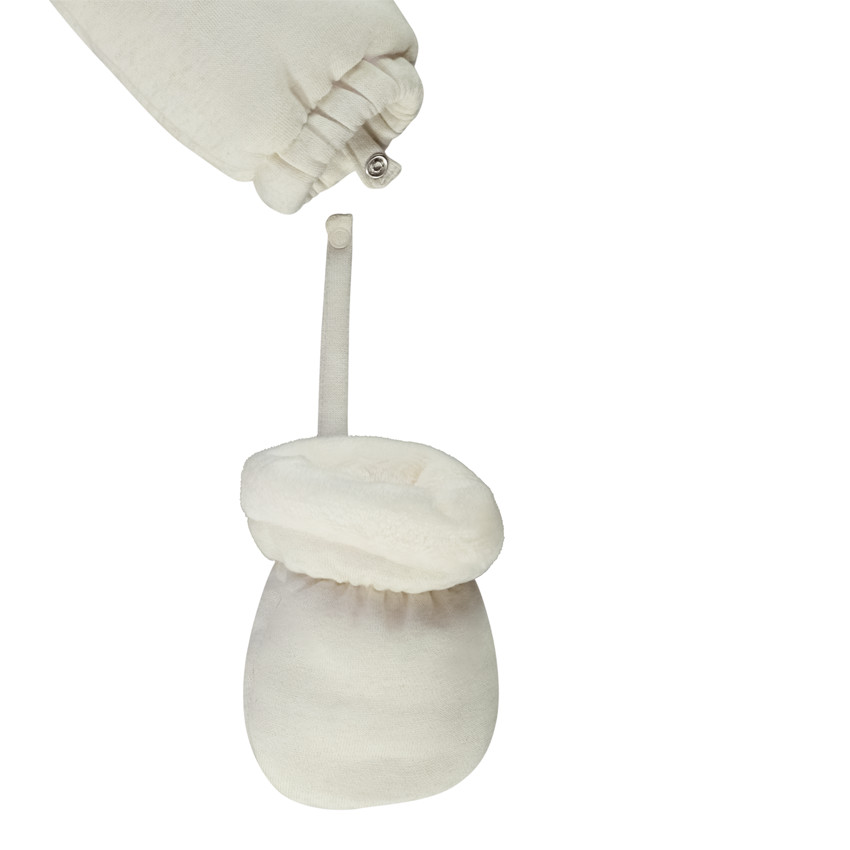 Pelele estampado pingüino para bebé niña con acabados diferentes según la edad 