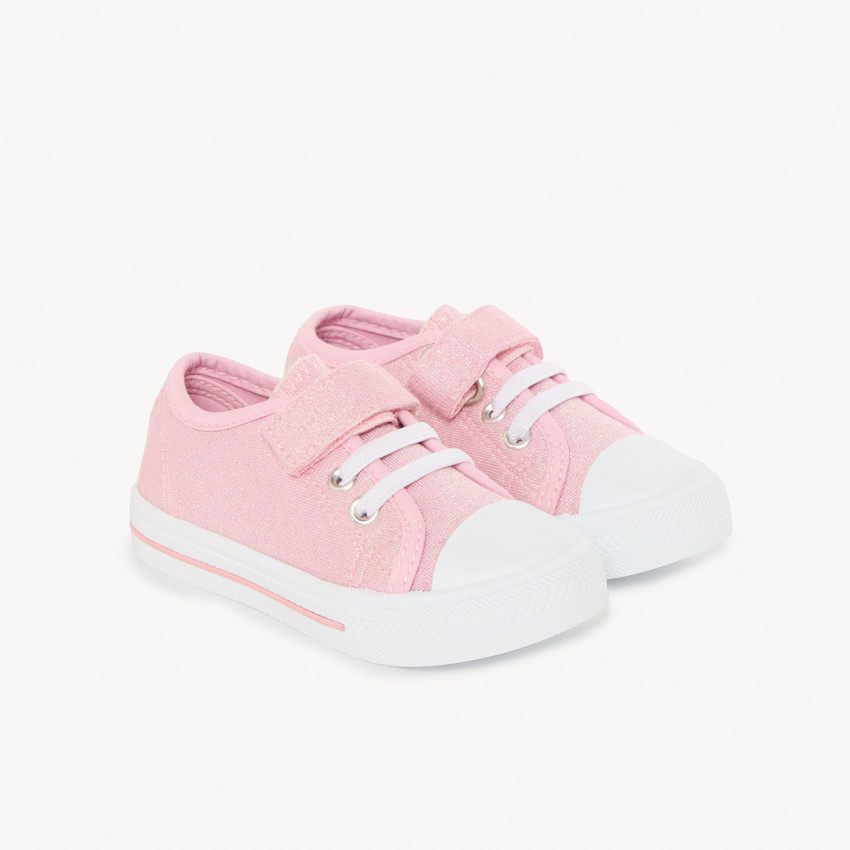 Zapatillas bajas de lona lilas con purpurina, con velcro y cordones para niña 