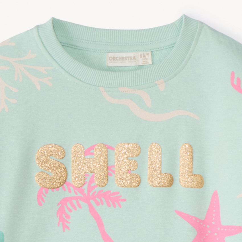 Sudadera oversized de felpa con estampado de purpurina para niña. 