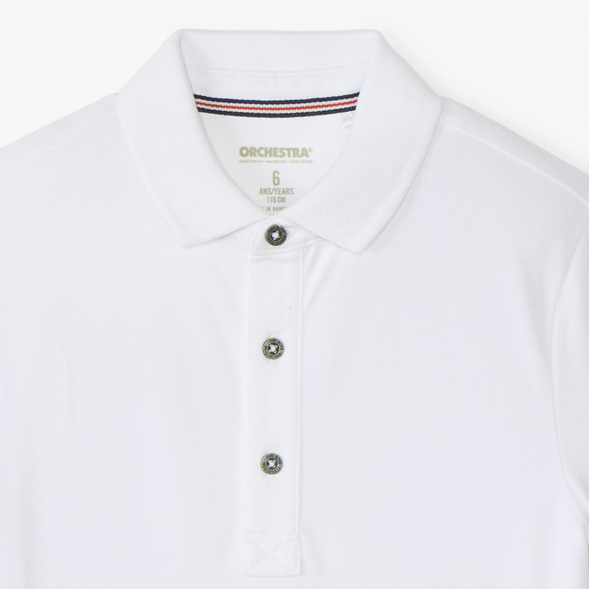 Polo de algodón de manga corta en color liso para niño 