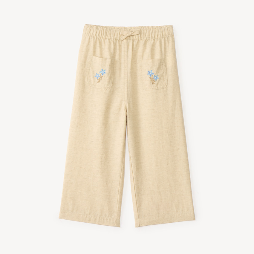 Pantalón amplio con bordado de flores para niña. 