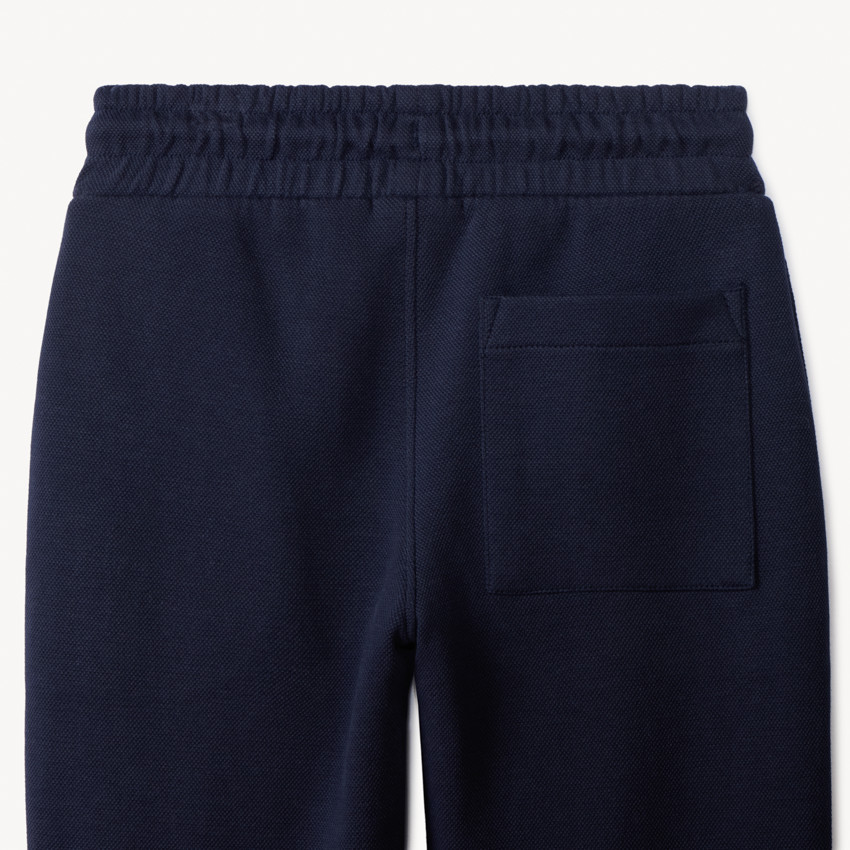 Conjunto sudadera fantasía con pantalón de chándal liso para niño 