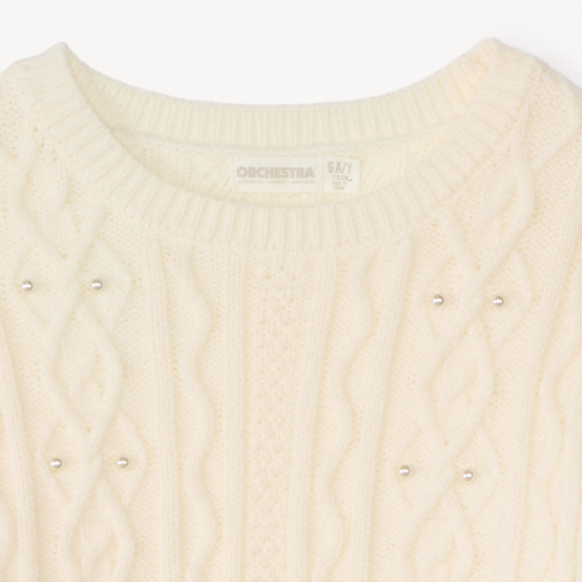 Suéter oversize de punto trenzado con perlas para niña. 