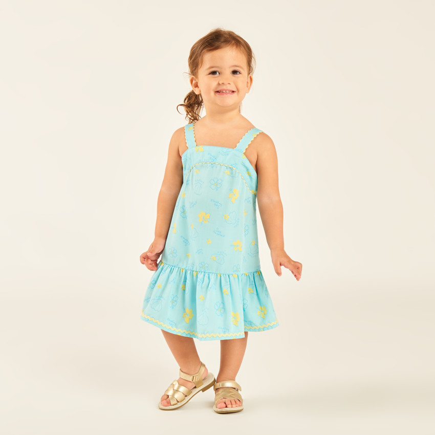 Vestido de tirantes en tela tubular con estampado de conchas y flores para niña bebé. 