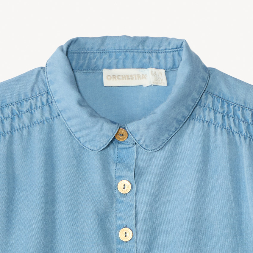 Camisa de manga corta con hombros fruncidos y flores bordadas para niña. 