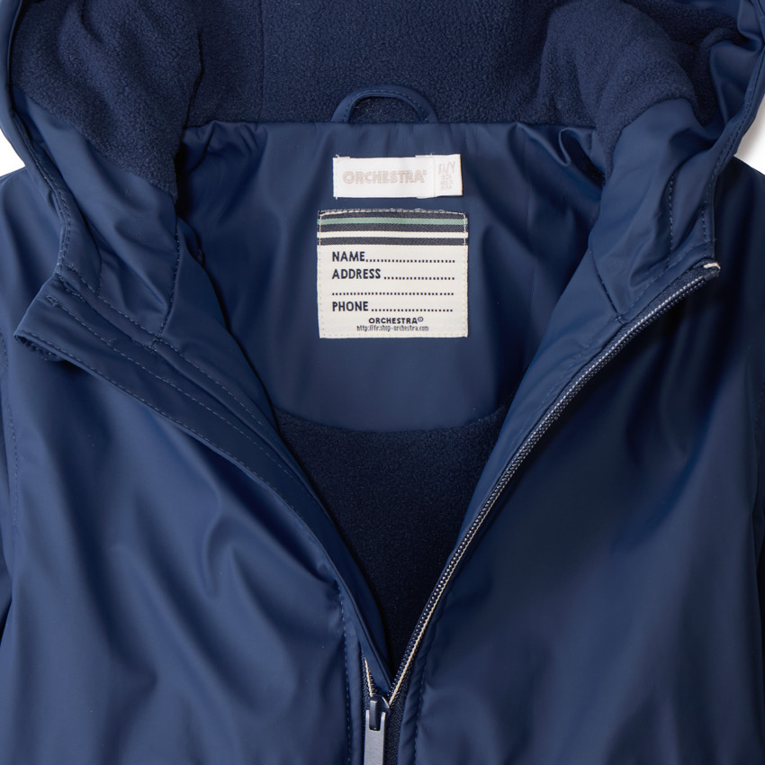 Parka de goma con capucha y forro de micropolar para niño. 