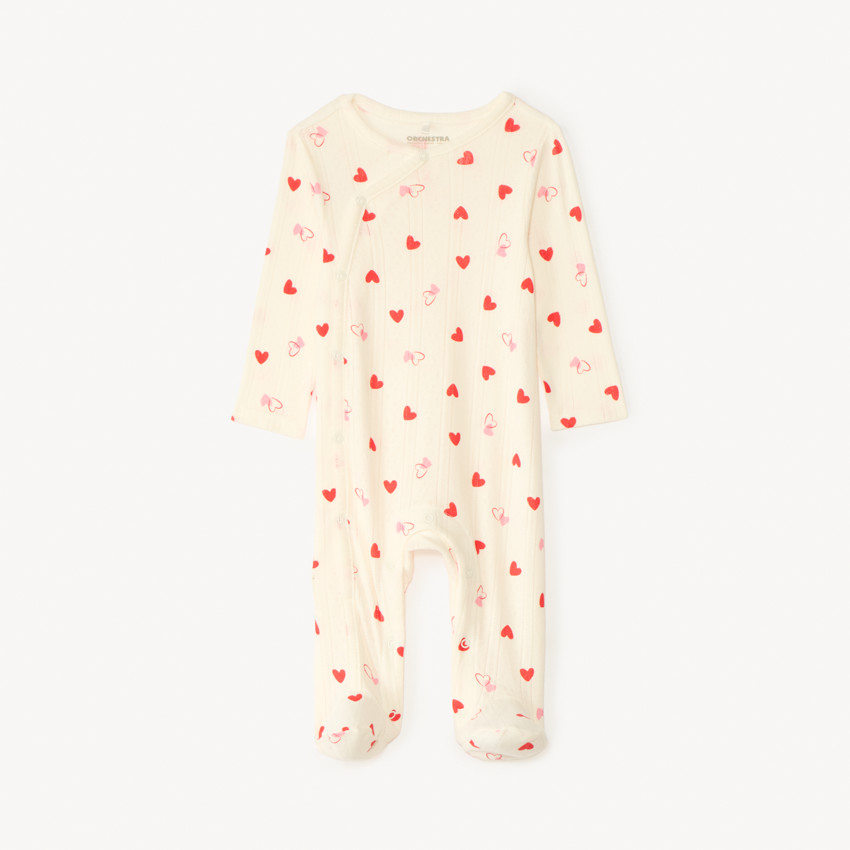 Pelele de punto con estampado de corazones para bebé niña con diferentes aperturas según la edad 