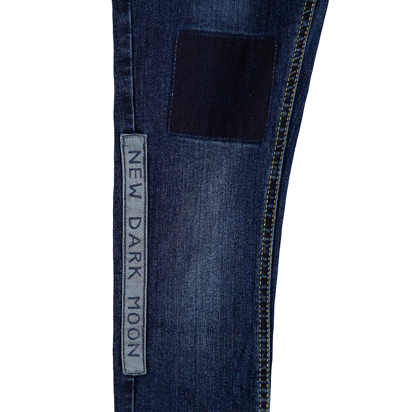 Júnior - Vaquero de efecto desgastado con parches e inscripciones estampadas 