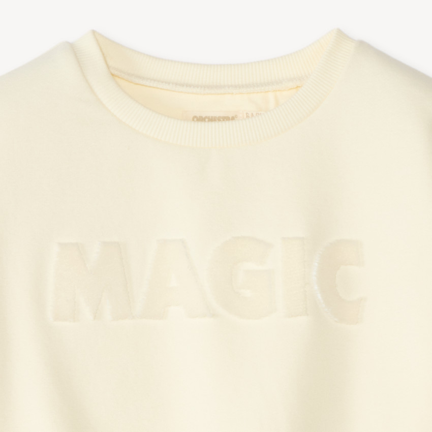 Sudadera de niña de felpa con base elástica y bordado de strass. 