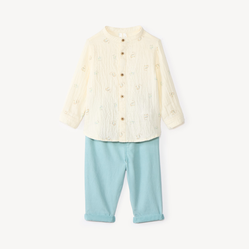 Conjunto de 2 piezas de camisa y pantalón para bebé niño con estampados de dinosaurios. 