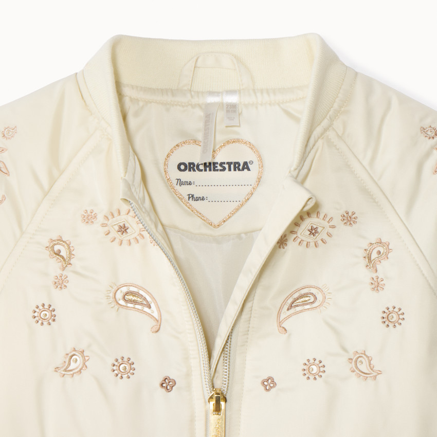 Bonito bomber satinado con bordados cachemire para niña. 