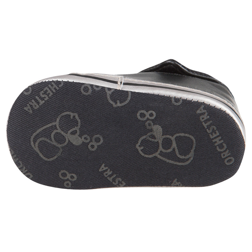 Zapatos merceditas de caña alta de color negro con pliegue y con cordones 