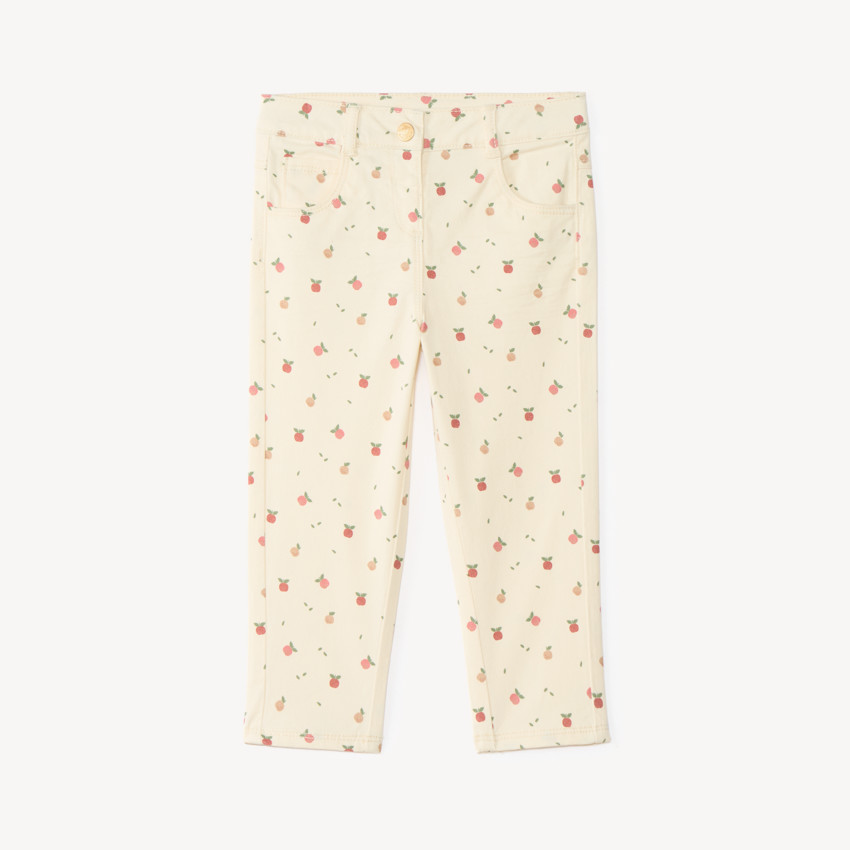 Pantalón slim para niña con estampado de manzana 