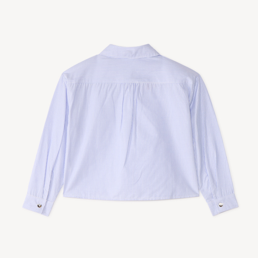 Camisa de niña de manga larga a rayas con detalles plateados. 
