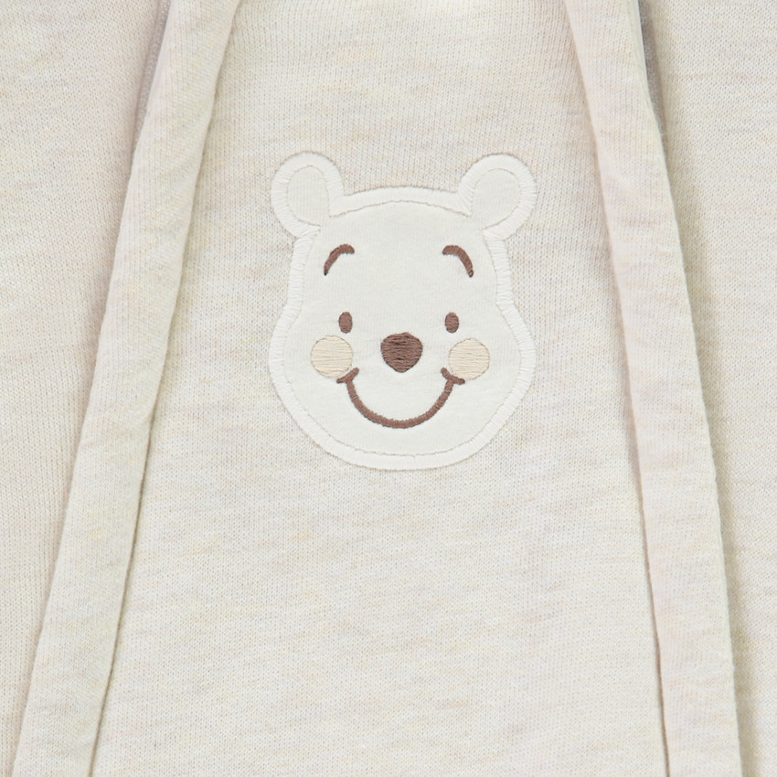 Buzo Winnie Disney para bebé con diferentes acabados según la edad 