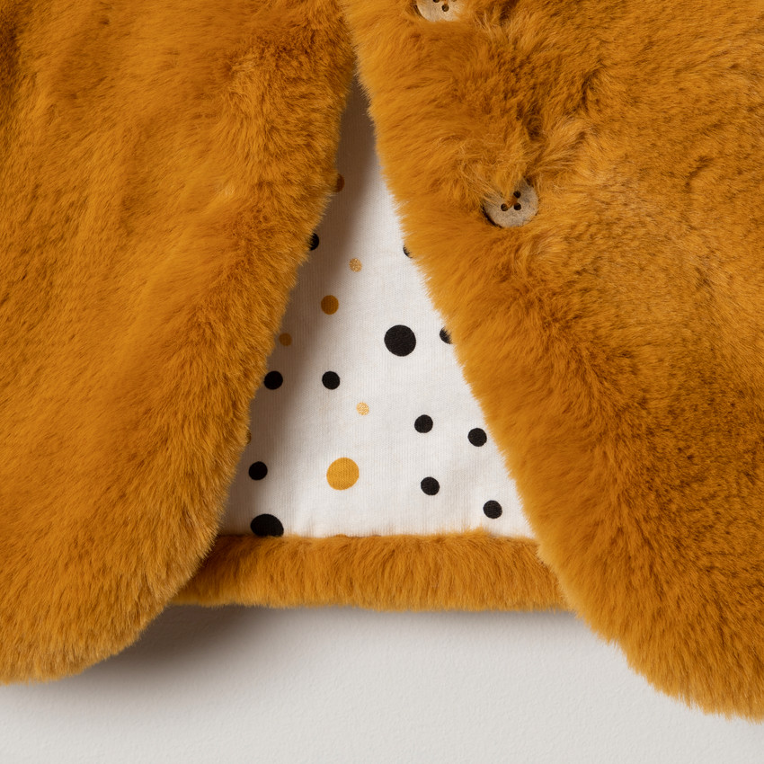 Chaleco sin manga falsa piel forrado  jersey con lunares  