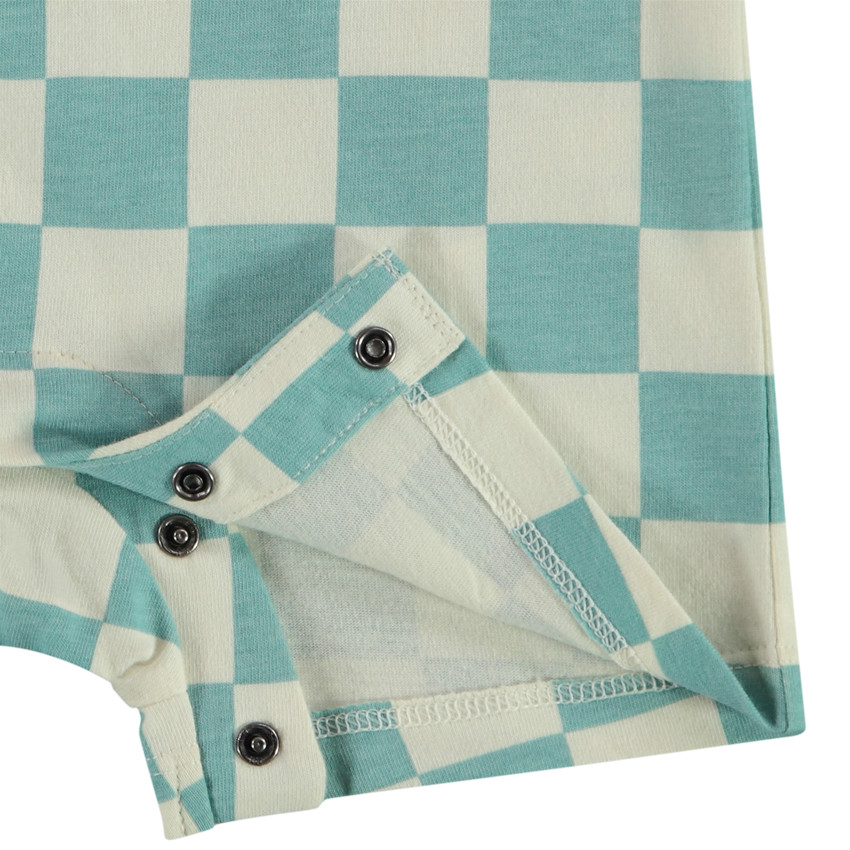 Pelele estampado de damero y print de skate para bebé niño 