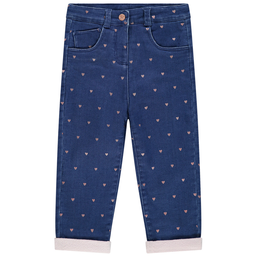 Vaqueros con efecto desgastado all over y forro de borreguillo 