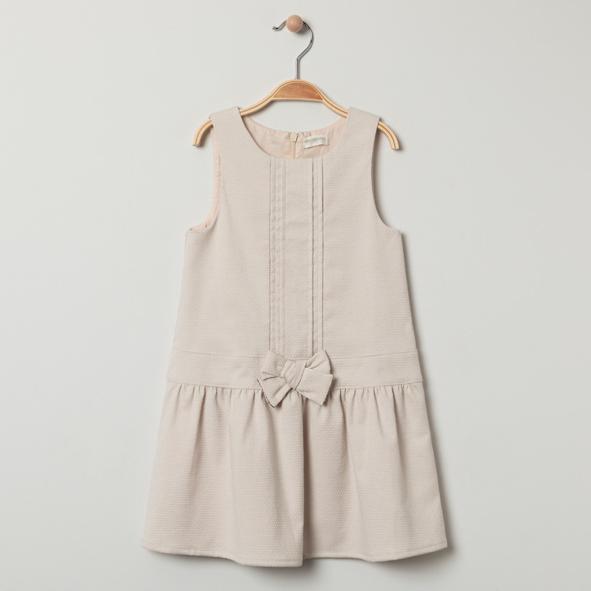 Vestido de ceremonia sin mangas punto fantasía y lazo 