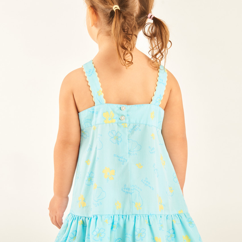 Vestido de tirantes en tela tubular con estampado de conchas y flores para niña bebé. 