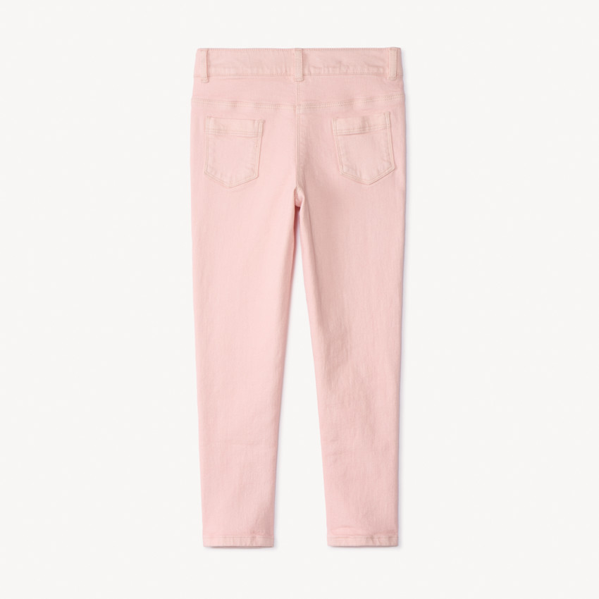 Vaqueros slim lisos con remaches para niña 