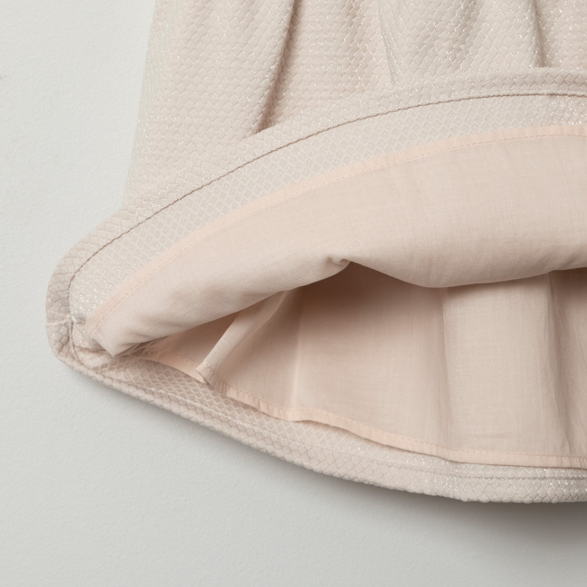 Vestido de ceremonia sin mangas punto fantasía y lazo 