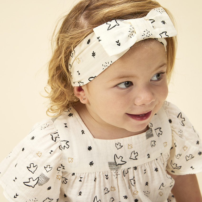 Banda con lazo estampado fantasía para bebé niña 