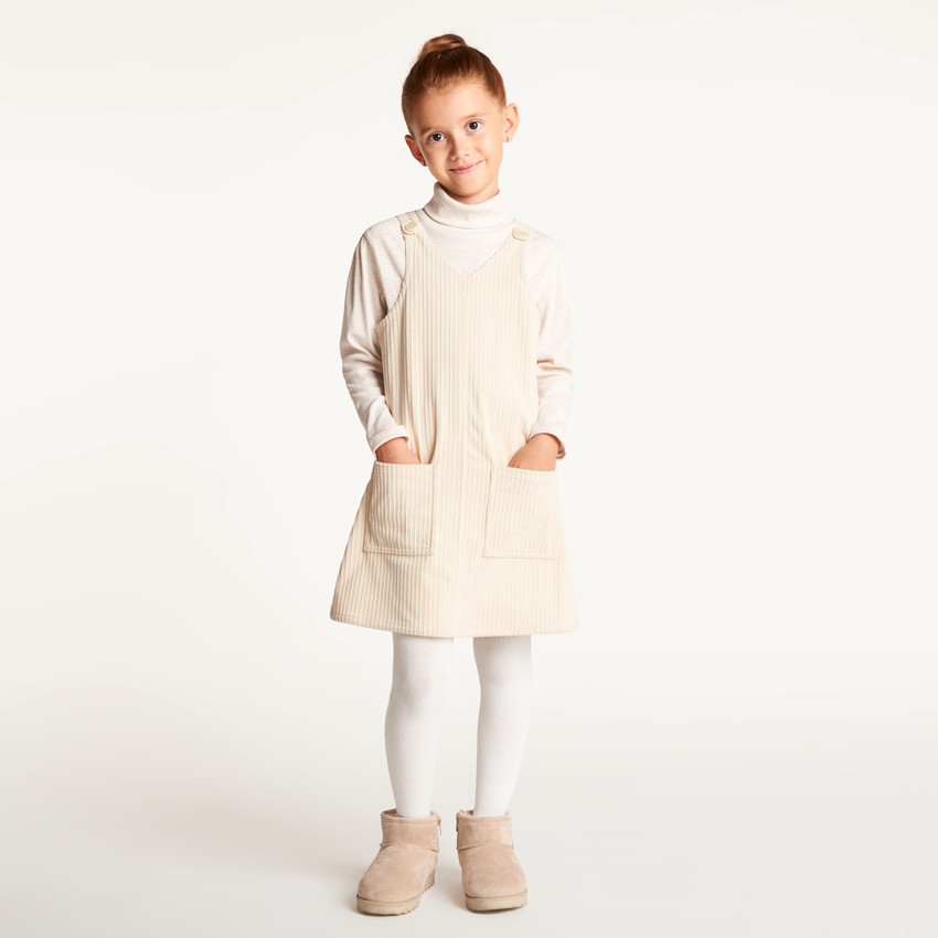 Vestido tipo peto para niña en pana acolchada 