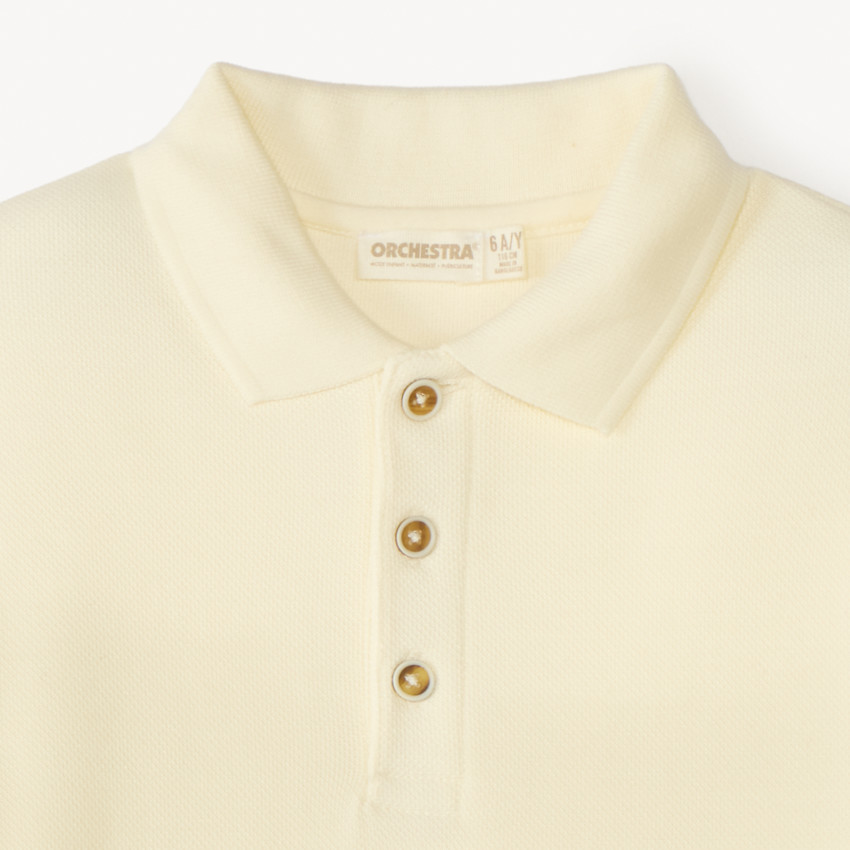 Polo de manga corta bicolor para niño. 
