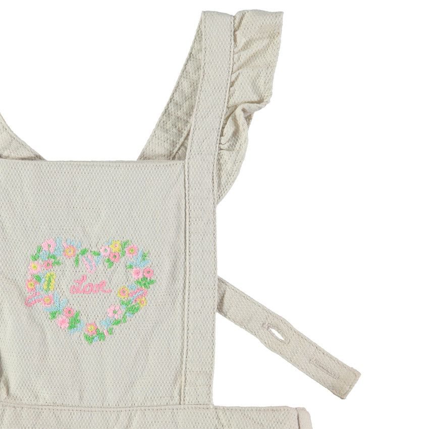 Conjunto Peto corto con bordados coloridos y polo rosa  Additional Conjunto Peto corto con bordados coloridos y polo rosa